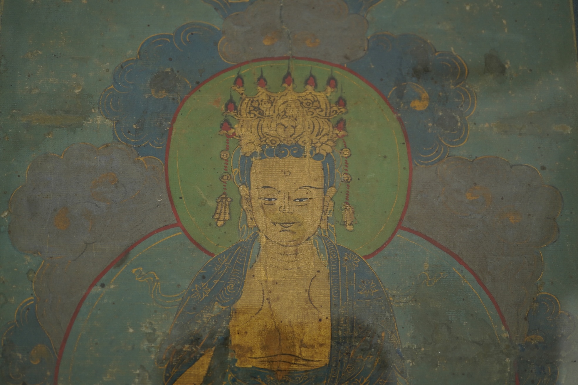 Sino-Tibetan School , (18th century or earlier), Bodhisattva seated on a throne, Painted thangka, 37cm x 22cm, gilt framed